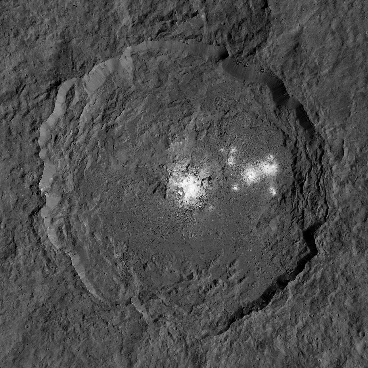 Dawn’s low-altitude view of Occator, showing the Cerealia and Vinalia salt deposits